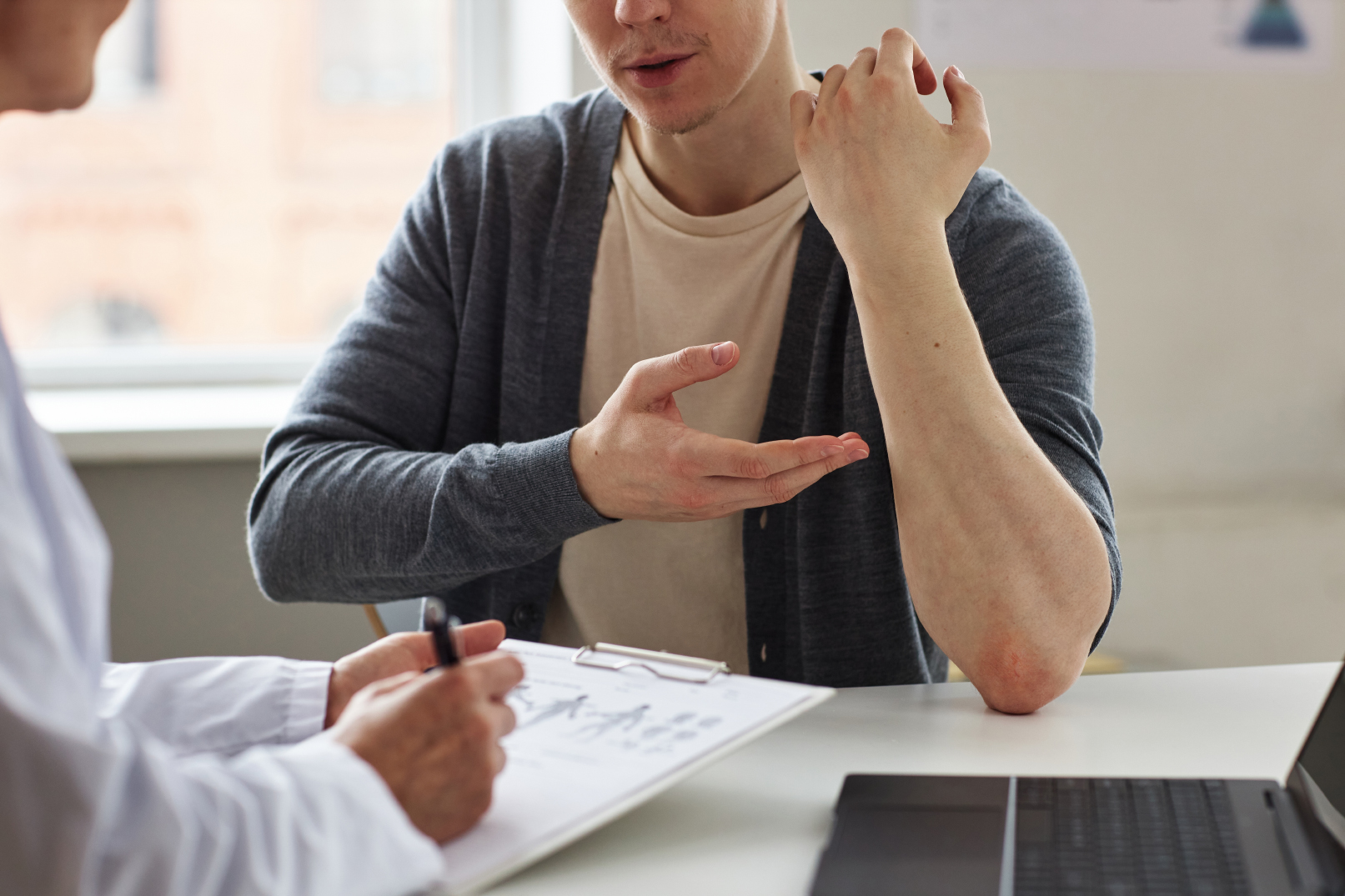 Patient consultation with a rheumatologist for psoriatic arthritis
