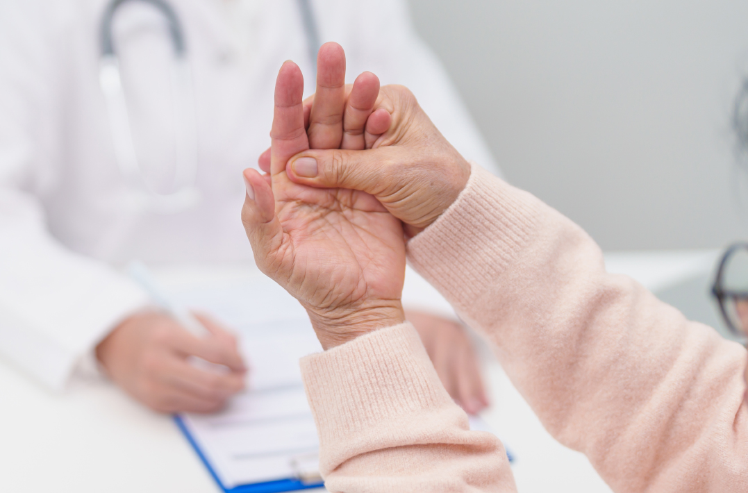 A consultation with a rheumatologist for finger joint stiffness.